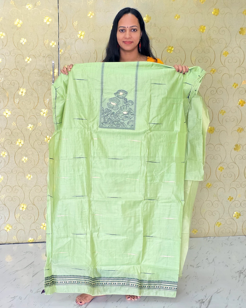 Full view of the light green Jamdani floral salwar material showcasing its elegant traditional design from Dritha Designs, DD1209.