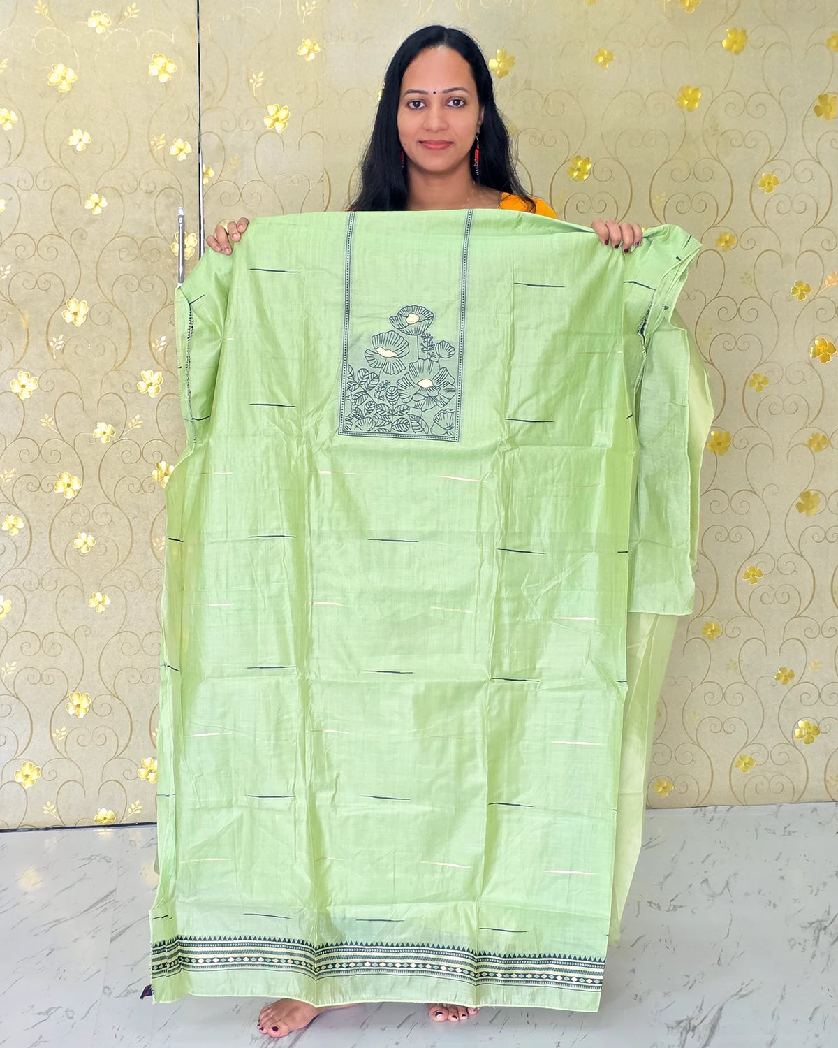 Full view of the light green Jamdani floral salwar material showcasing its elegant traditional design from Dritha Designs, DD1209.