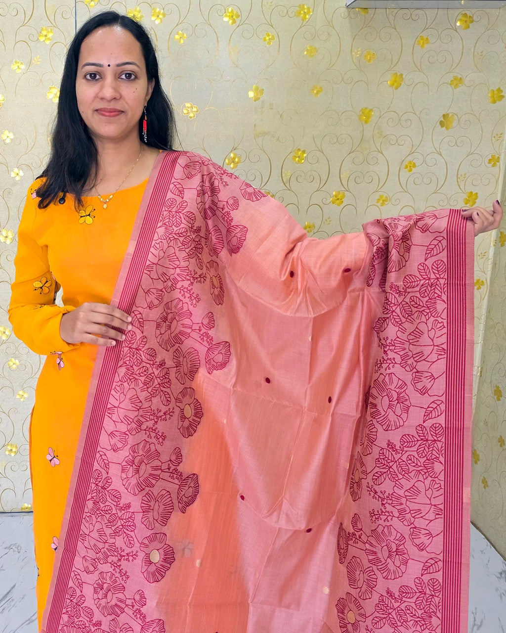 A peach Jamdani floral dupatta with beautiful traditional detailing, part of the DD1209 salwar material by Dritha Designs.