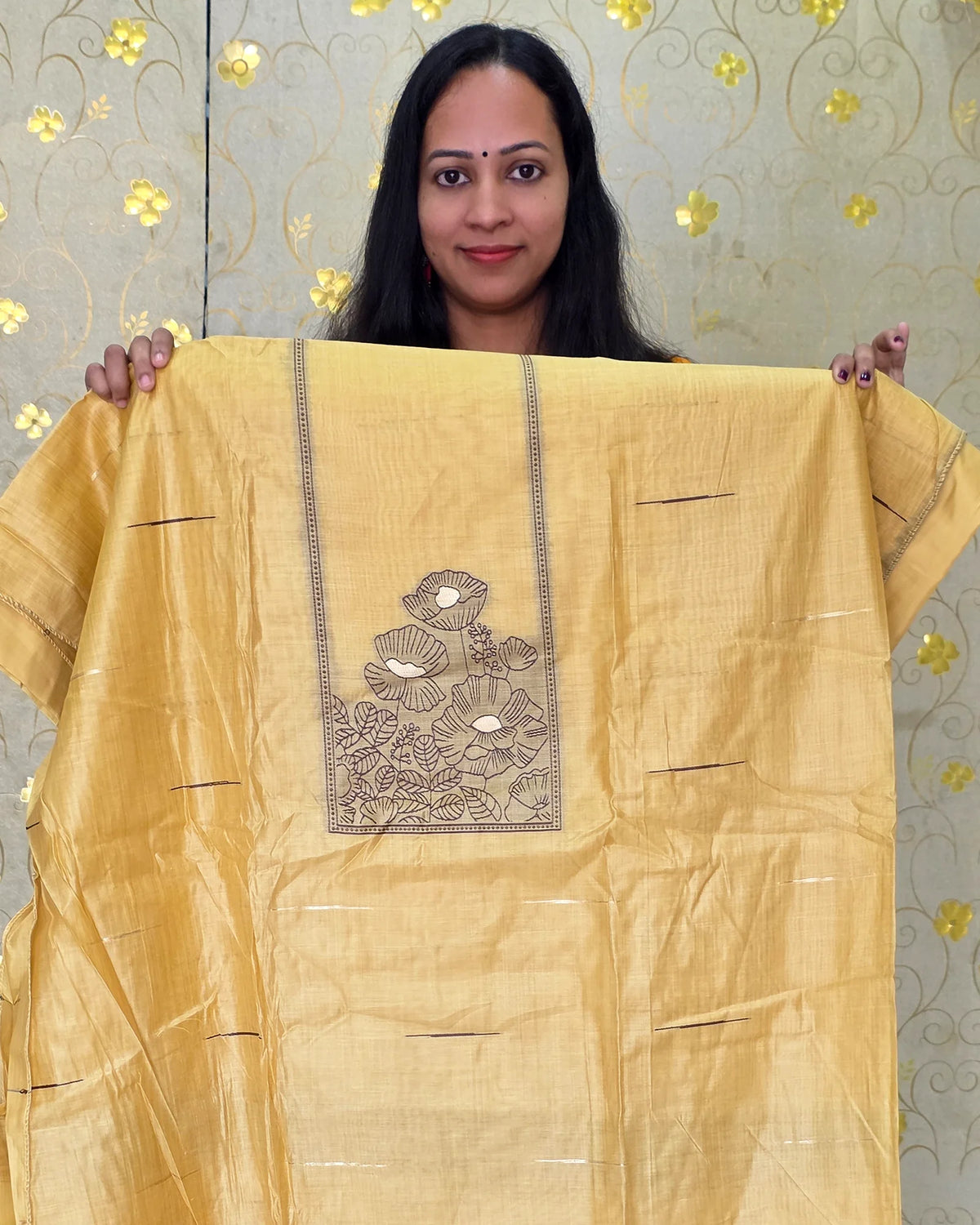 A close-up view of the yellow Jamdani floral salwar material featuring elegant floral detailing by Dritha Designs, DD1209.